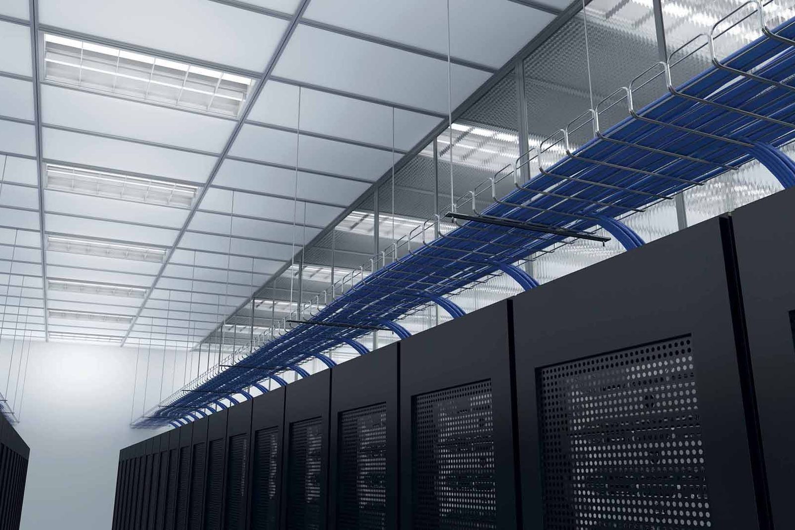 Cable tray routing above rack rows